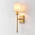 Shiori aged brass wall light with fabric shade