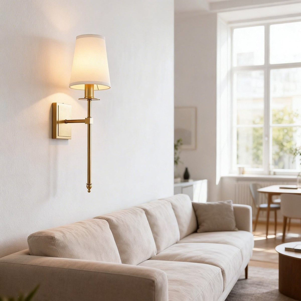 Shiori brass wall light in a living room