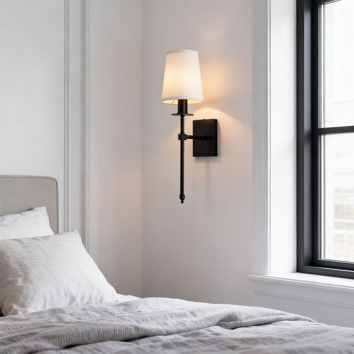 Shiori matte black wall light in a bedroom