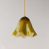 Green glass skirt pendant light close up