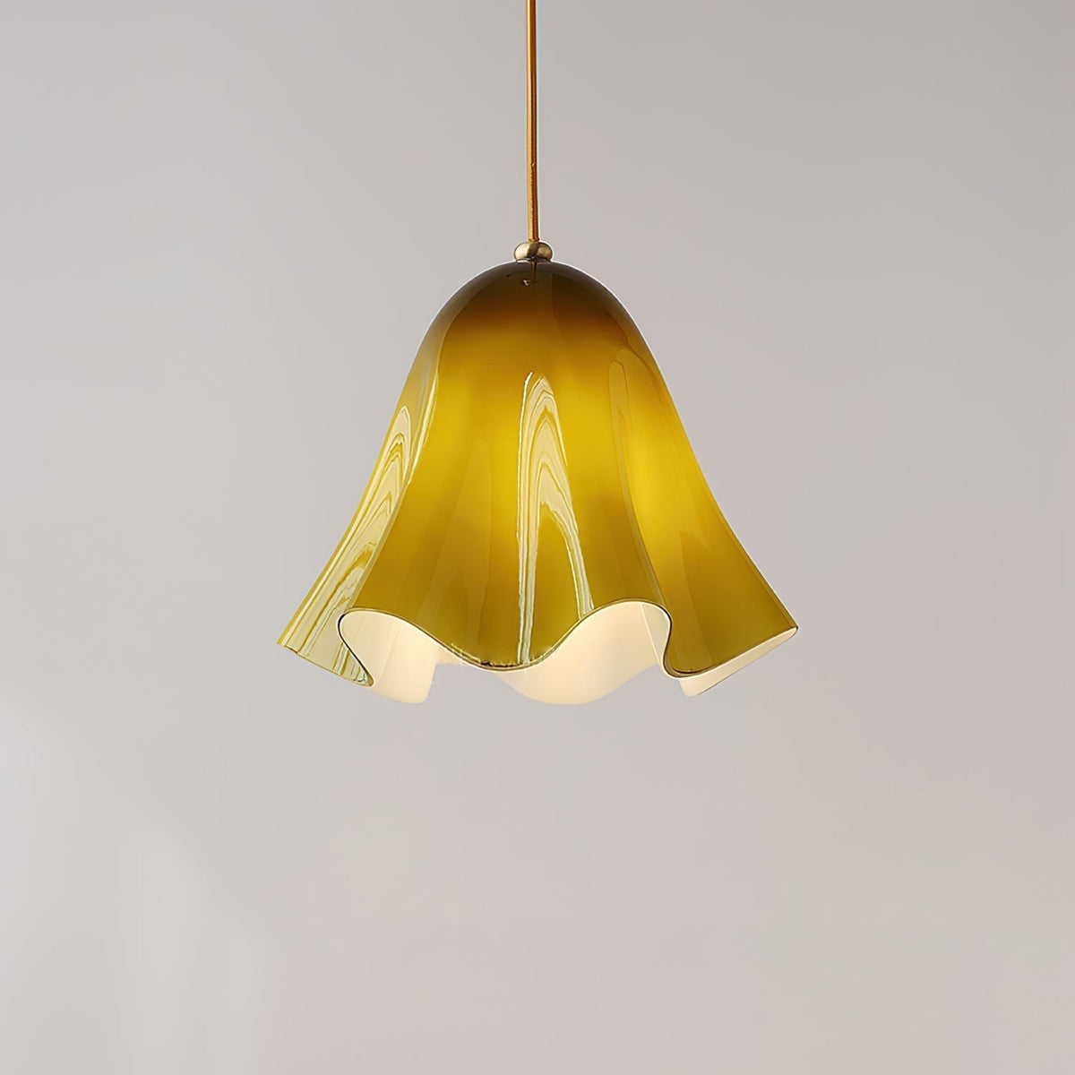Green glass skirt pendant light lit