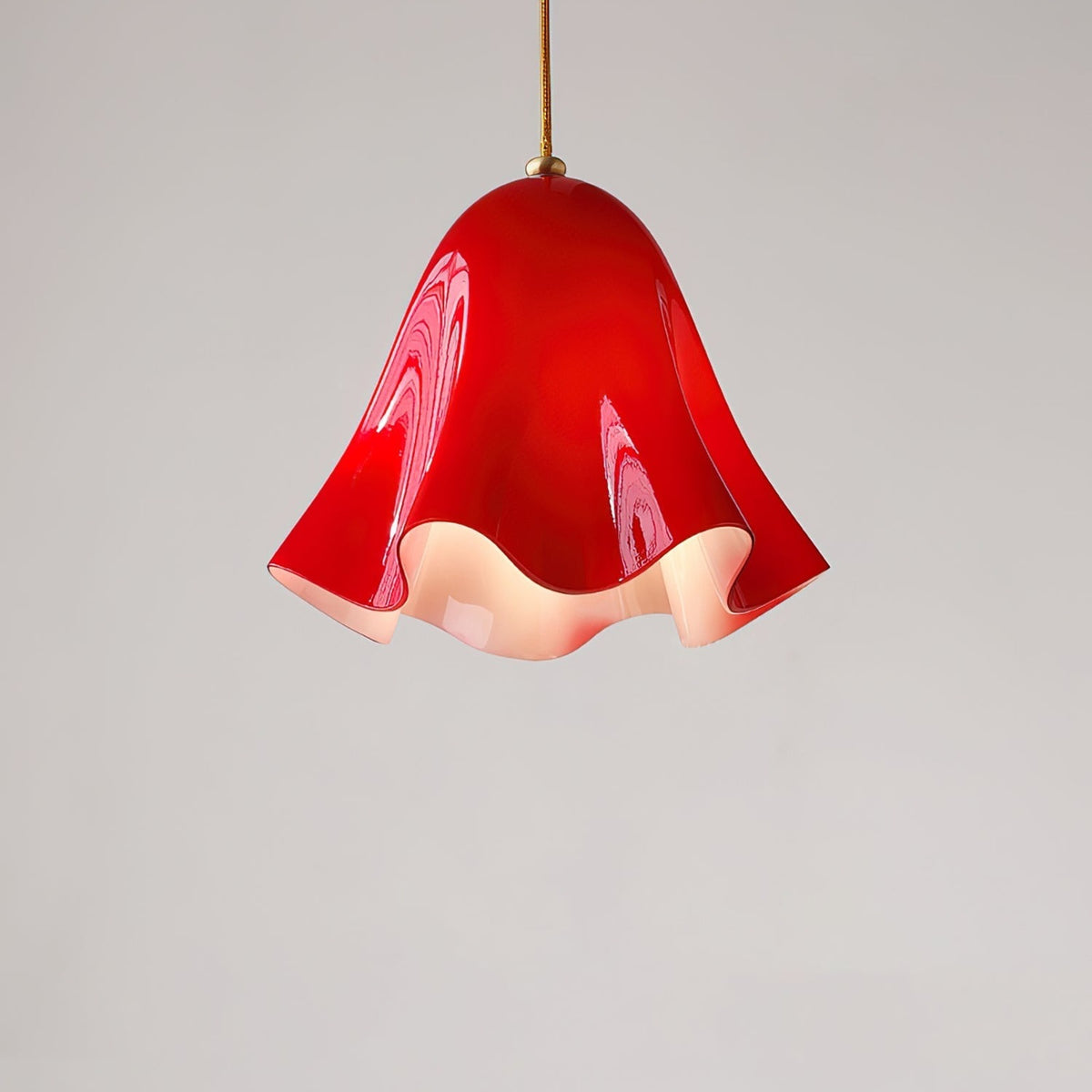 Red glass skirt pendant light lit