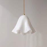 White glass skirt pendant light close up
