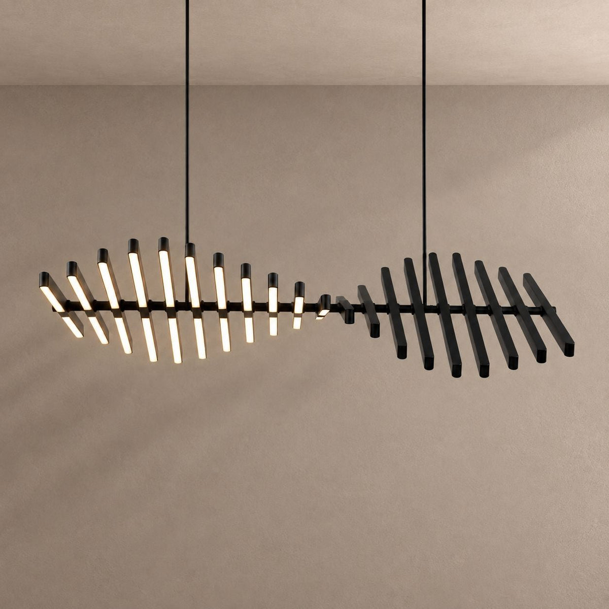 Talia twisted LED pendant glowing against a plaster wall