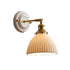 Suzu ceramic brass adjustable wall light, fluted bell