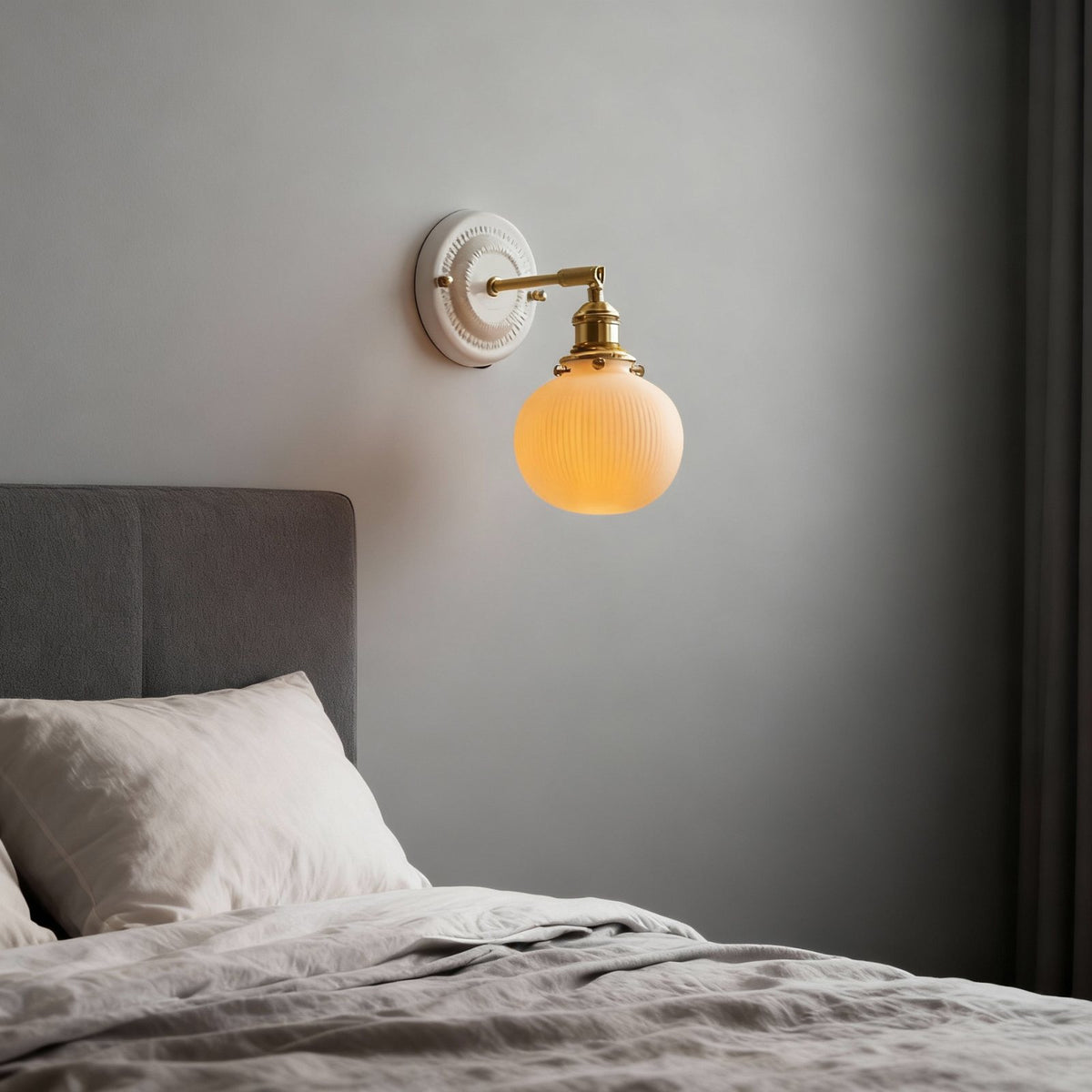 Suzu ribbed globe above a headboard