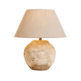 Tsumugi round ceramic table lamp with fabric shade on white