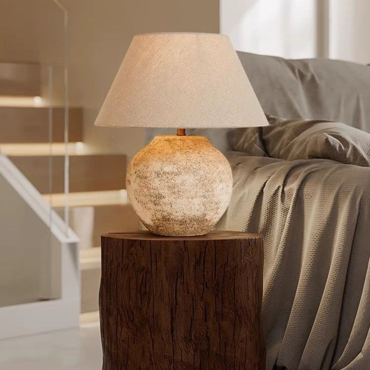 Tsumugi ceramic table lamp on a timber stump bedside table