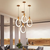 Ylva rings hung at staggered heights in an open plan kitchen